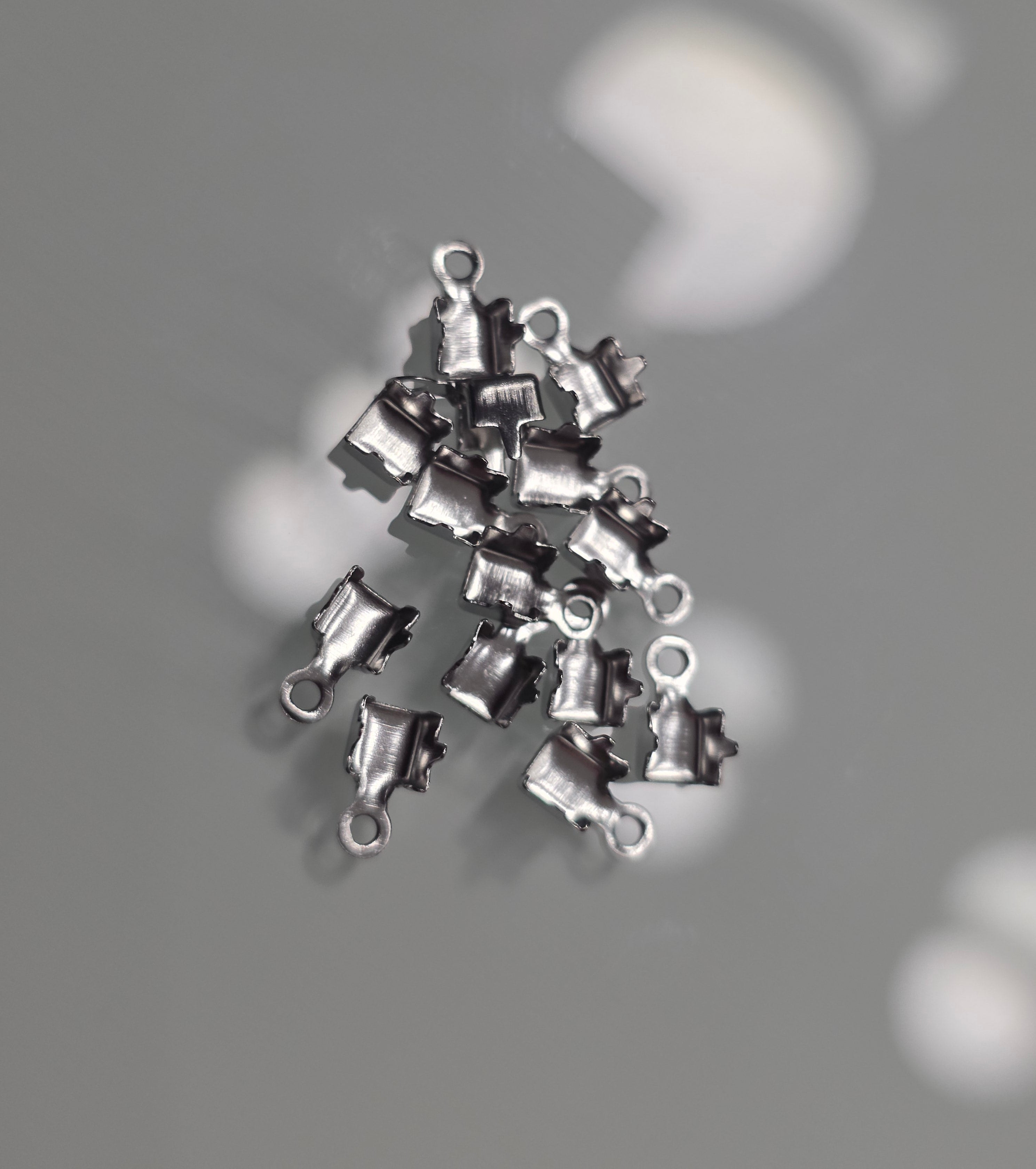Tennis chain crimps