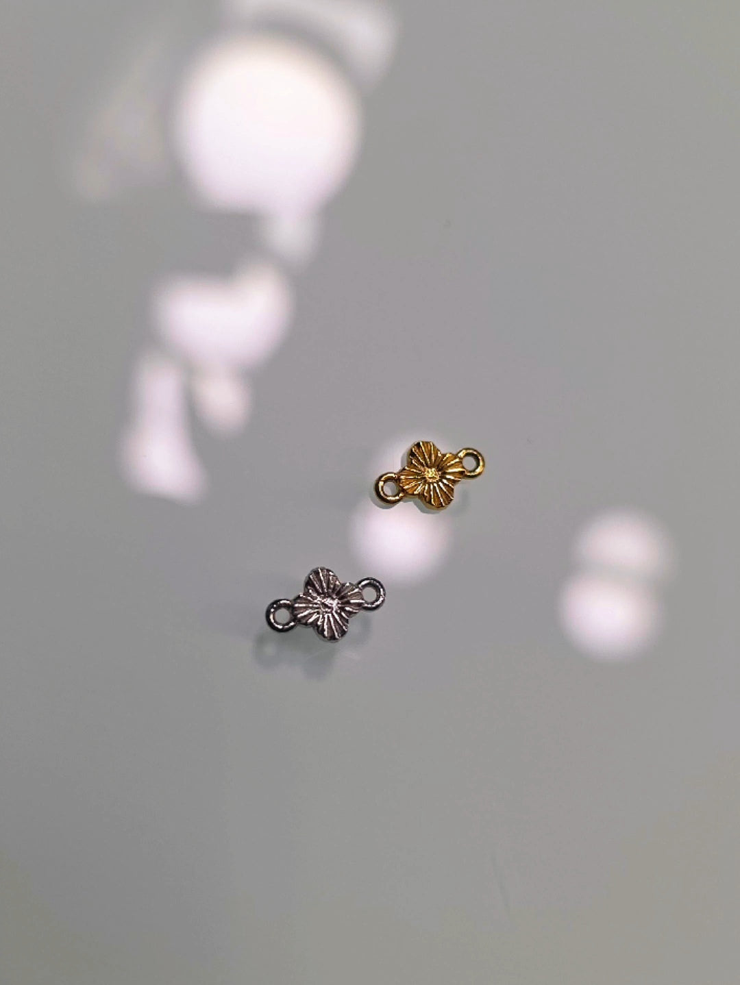Clover sunburst charm